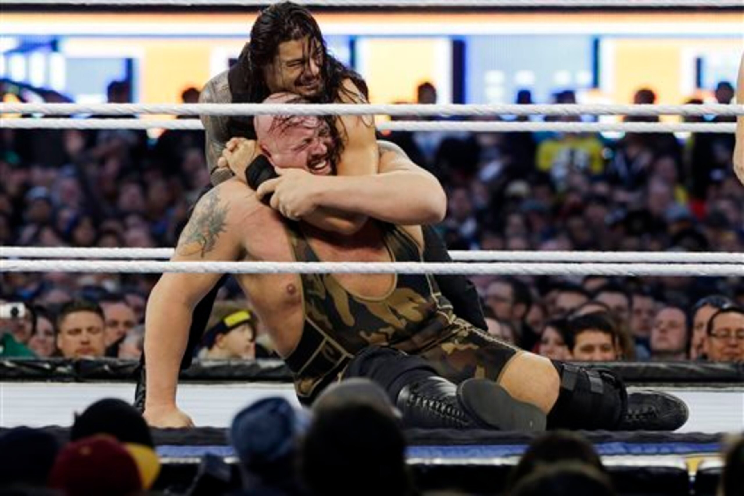 Roman Reigns battles Big Show. Roman Reigns battles Big Show.