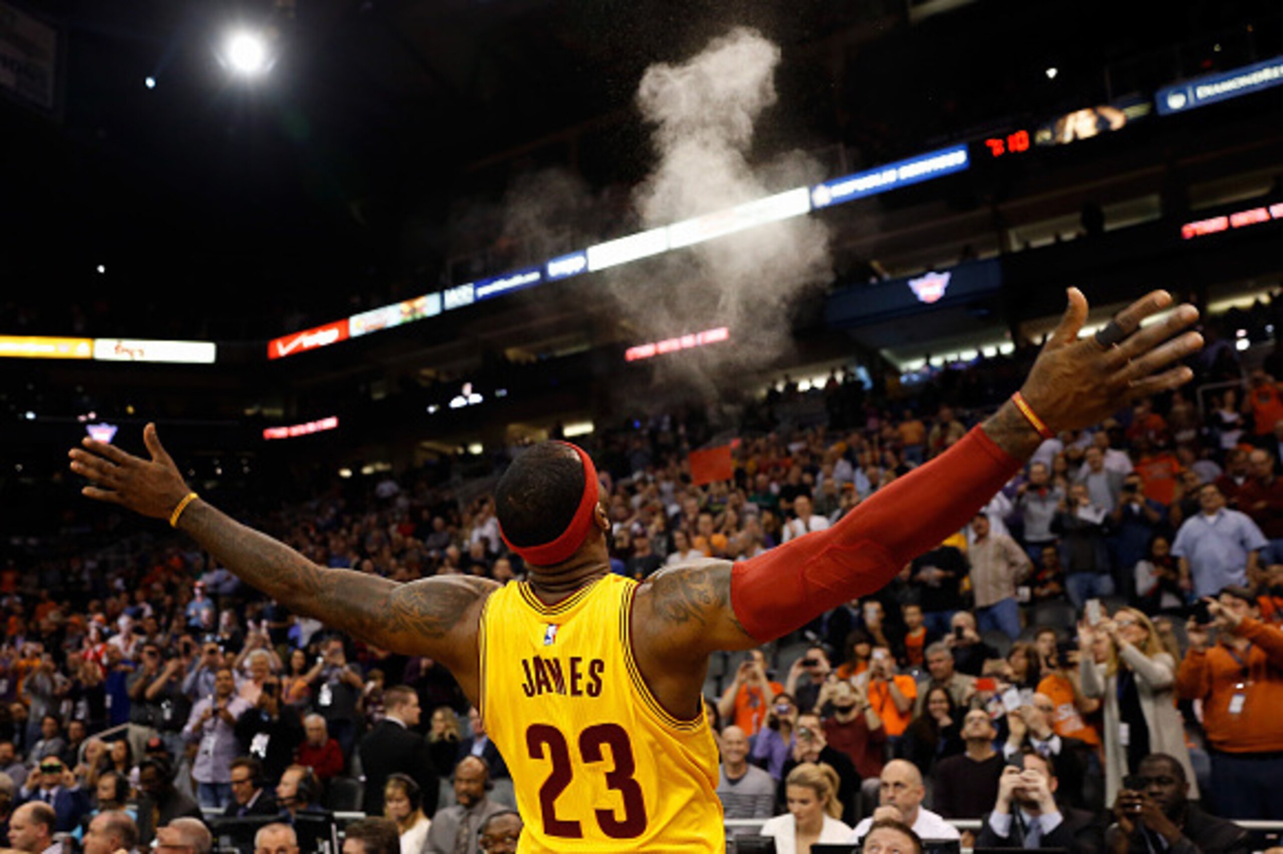 PHOENIX, AZ - JANUARY 13: LeBron James #23 of the Cleveland Cavaliers throws powder into the air before the start of the NBA game against the Phoenix Suns at US Airways Center on January 13, 2015 in Phoenix, Arizona. NOTE TO USER: User expressly acknowl PHOENIX, AZ - JANUARY 13: LeBron James #23 of the Cleveland Cavaliers throws powder into the air before the start of the NBA game against the Phoenix Suns at US Airways Center on January 13, 2015 in Phoenix, Arizona. NOTE TO USER: User expressly acknowl