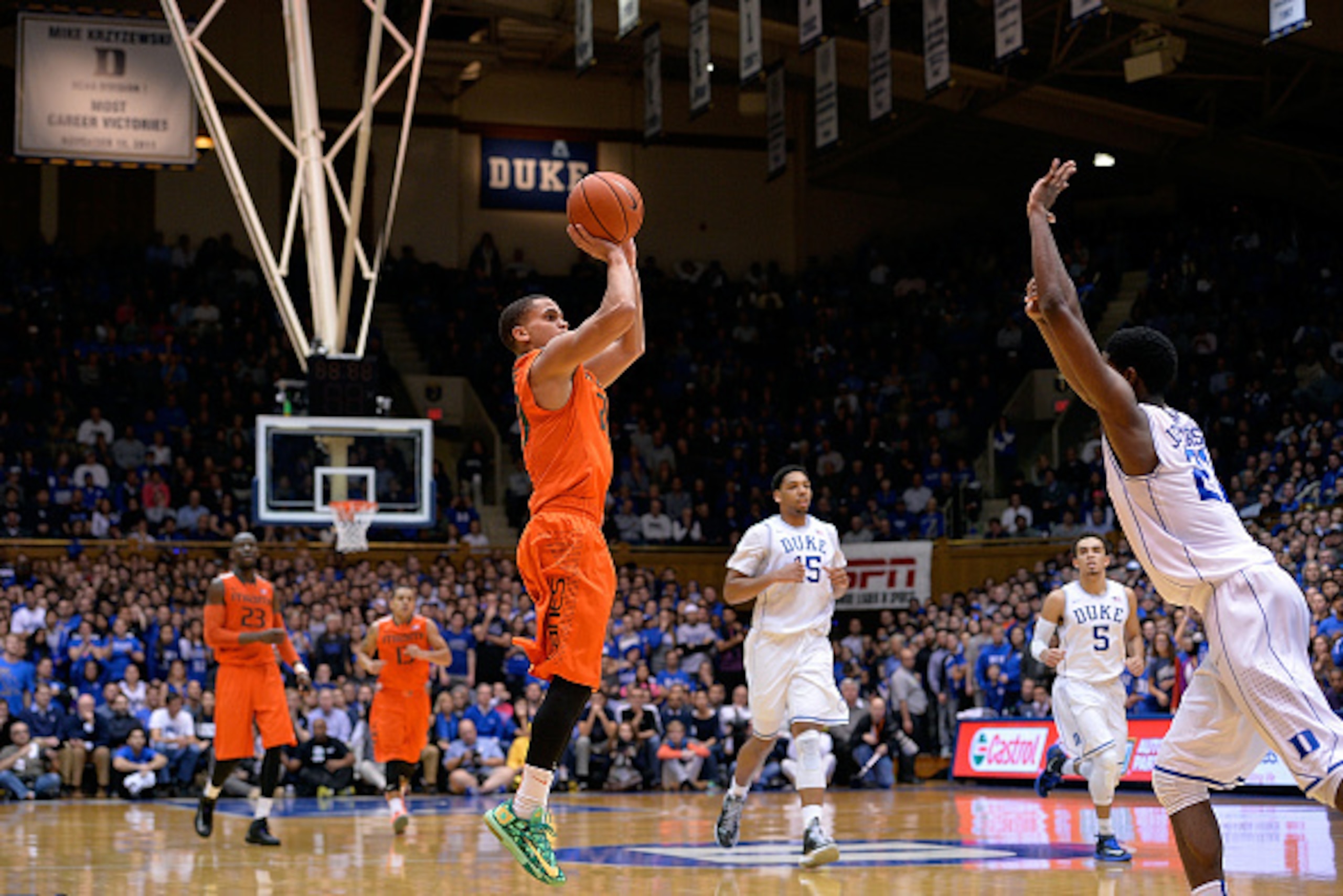 DURHAM, NC - JANUARY 13:  Manu Lecomte #20 of the Miami Hurricanes takes a three-point shot against the Duke Blue Devils during their game at Cameron Indoor Stadium on January 13, 2015 in Durham, North Carolina. Miami won 90-74.  (Photo by Grant Halverson