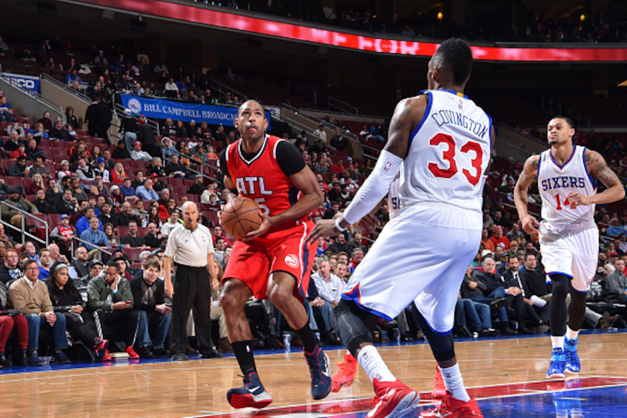 PHILADELPHIA, PA - JANUARY 13: Al Horford #15 of the Atlanta Hawks goes up for the shot against the Philadelphia 76ers at Wells Fargo Center on January 13, 2015 in Philadelphia, Pennsylvania NOTE TO USER: User expressly acknowledges and agrees that, by do