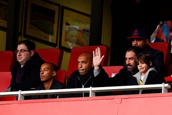 LONDON, ENGLAND - JANUARY 11:  Former Arsenal players Thierry Henry and Robert Pires watch the Barclays Premier League match between Arsenal and Stoke City at Emirates Stadium on January 11, 2015 in London, England.  (Photo by Julian Finney/Getty Images)