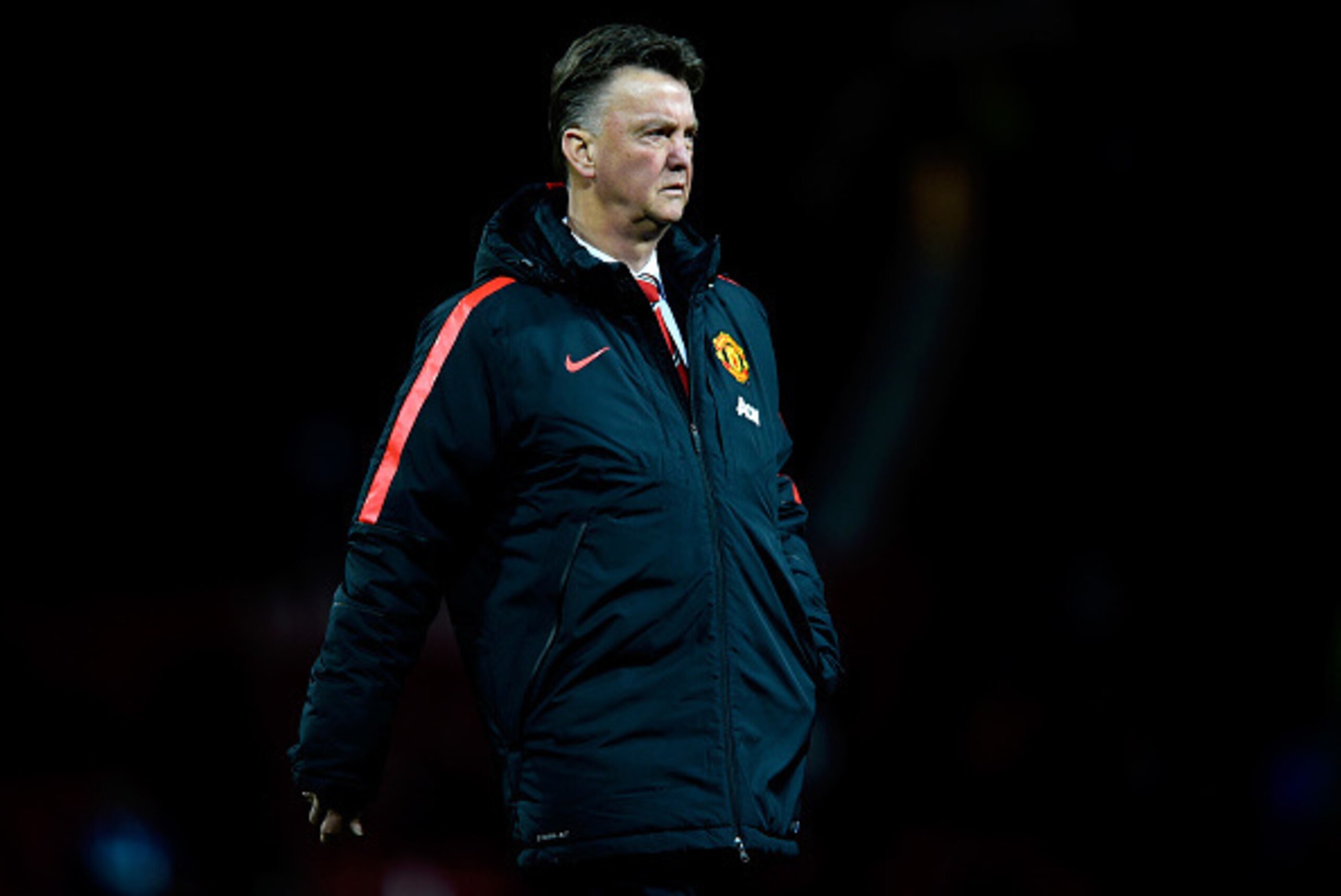 MANCHESTER, ENGLAND - DECEMBER 02:  Manchester United Manager Louis van Gaal looks on prior to the Barclays Premier League match between Manchester United and Stoke City at Old Trafford on December 2, 2014 in Manchester, England.  (Photo by Mike Hewitt/Ge
