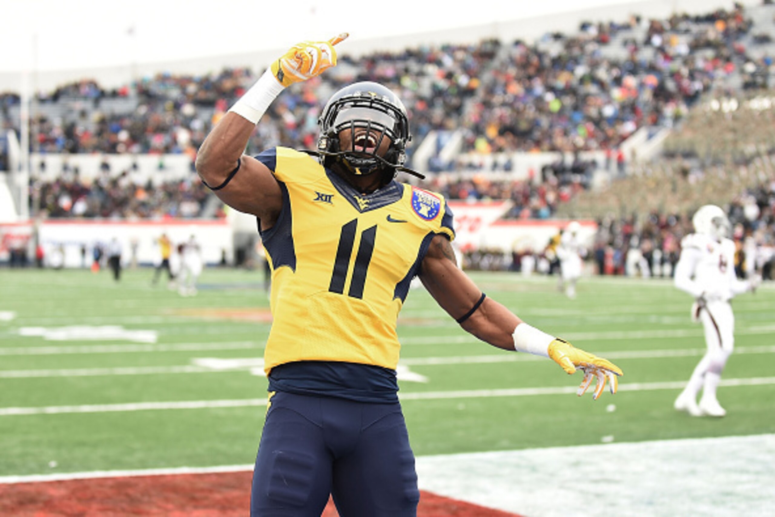 MEMPHIS, TN - DECEMBER 29: Kevin White #11 of the West Virginia Mountaineers reacts to a touchdown against the Texas A&M Aggies during the second quarterof the 56th annual Autozone Liberty Bowl at Liberty Bowl Memorial Stadium on December 29, 2014 in Mem MEMPHIS, TN - DECEMBER 29: Kevin White #11 of the West Virginia Mountaineers reacts to a touchdown against the Texas A&M Aggies during the second quarterof the 56th annual Autozone Liberty Bowl at Liberty Bowl Memorial Stadium on December 29, 2014 in Mem
