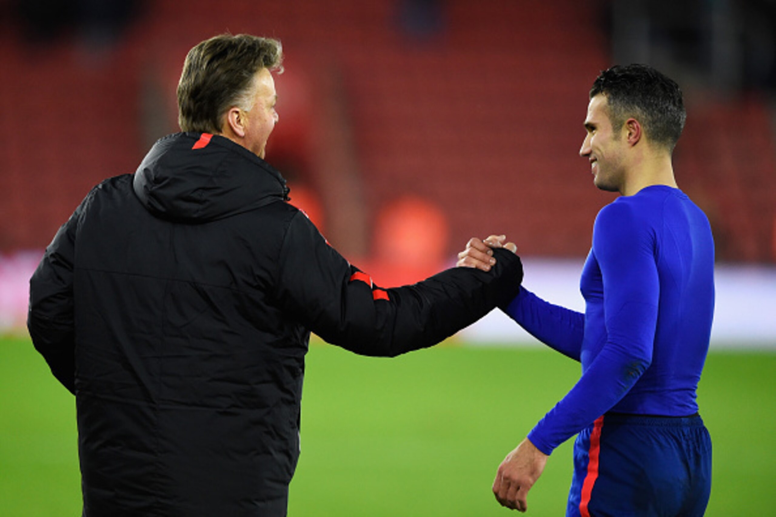 SOUTHAMPTON, ENGLAND - DECEMBER 08: Louis van Gaal, manager of Manchester United shakes hands with Robin van Persie of Manchester United after the Barclays Premier League match between Southampton and Manchester United at St Mary's Stadium on December 8, 
