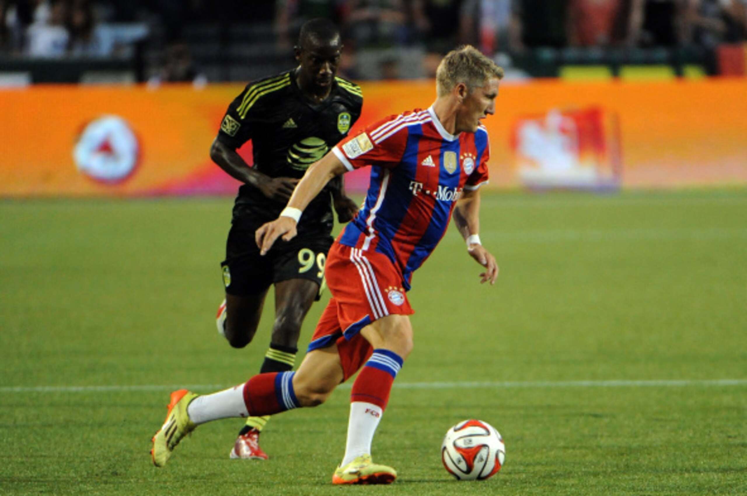 PORTLAND, OR - AUGUST 06: Bastian Schweinsteiger #31 of Bayern Munich tries to get a round Bradley Wright-Phillips of the MLS All-Stars duing the second half of the game at Providence Park on August 6, 2014 in Portland, Oregon.  (Photo by Steve Dykes/Gett