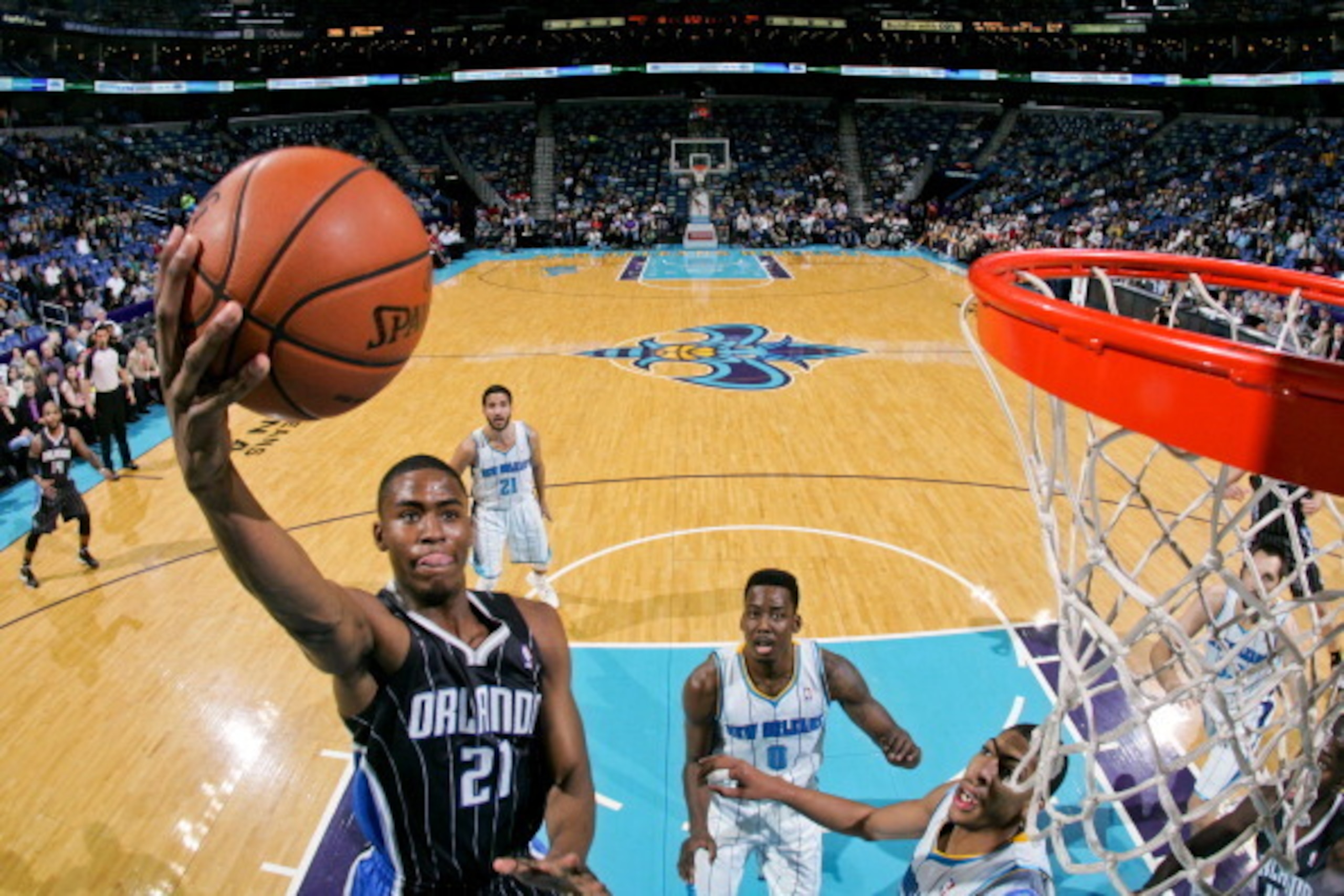 NEW ORLEANS, LA - MARCH 4: Moe Harkless #21 of the Orlando Magic drives to the basket against the New Orleans Hornets on March 4, 2013 at the New Orleans Arena in New Orleans, Louisiana. NOTE TO USER: User expressly acknowledges and agrees that, by downlo