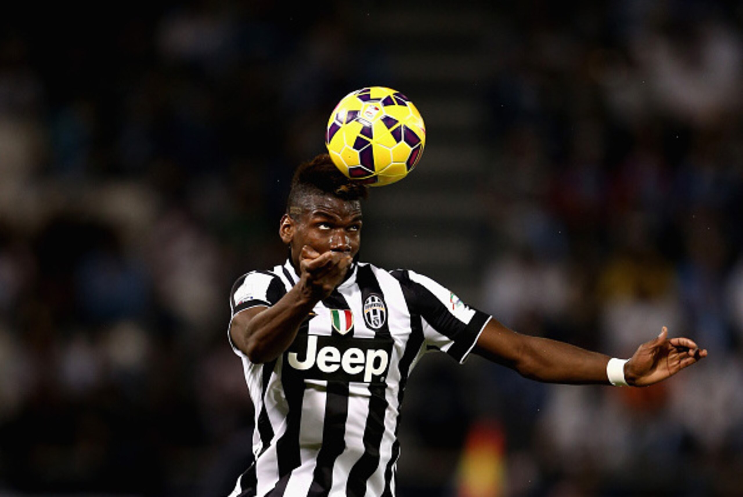 DOHA, QATAR - DECEMBER 22:  Paul Pogba of Juventus in action during the 2014 Italian Super Cup match between Juventus FC v SSC Napoli at the Jassim Bin Hamad Stadium on December 22, 2014 in Doha, Qatar.  (Photo by Warren Little/Getty Images)