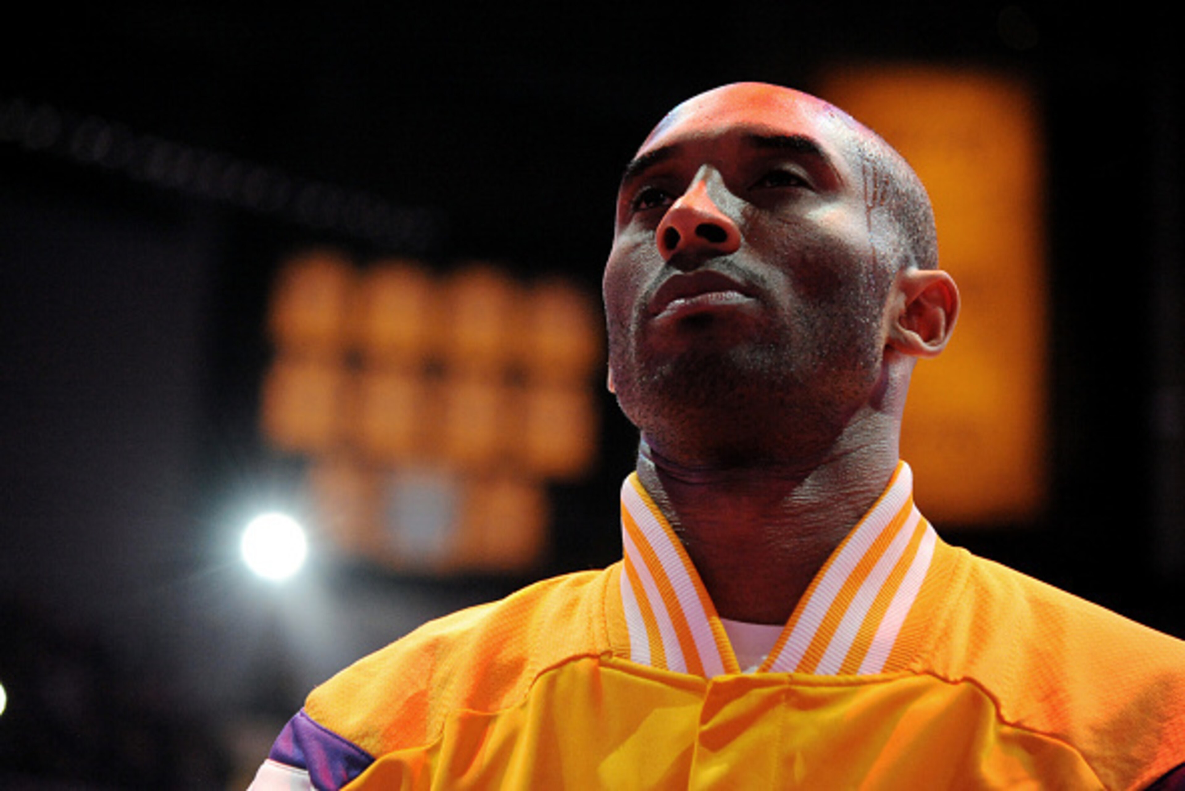 LOS ANGELES, CA - JANUARY 13: Kobe Bryant #24 of the Los Angeles Lakers stands for the national anthem before a game against the Miami Heat on January 13, 2015 in Los Angeles, California. NOTE TO USER: User expressly acknowledges and agrees that, by downl