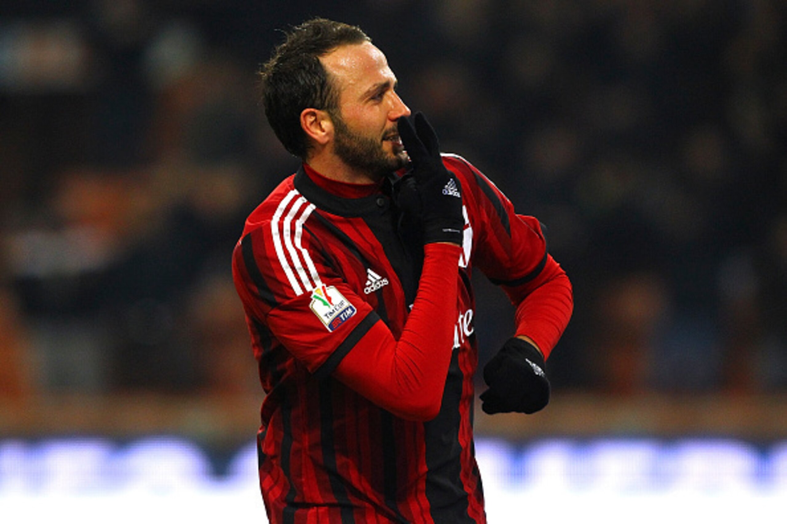 MILAN, ITALY - JANUARY 13:  Giampaolo Pazzini of AC Milan celebrates after scoring the opening goal during the TIM Cup match between AC Milan and US Sassuolo Calcio at Stadio Giuseppe Meazza on January 13, 2015 in Milan, Italy.  (Photo by Marco Luzzani/Ge