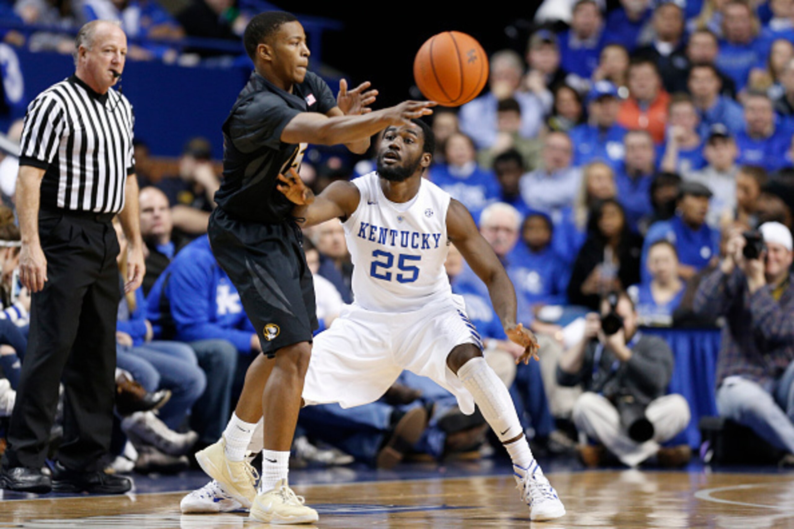 LEXINGTON, KY - JANUARY 13: Dominique Hawkins #25 of the Kentucky Wildcats defends against Wes Clark #15 of the Missouri Tigers during the game at Rupp Arena on January 13, 2015 in Lexington, Kentucky. Kentucky defeated Missouri 86-37. (Photo by Joe Robbi