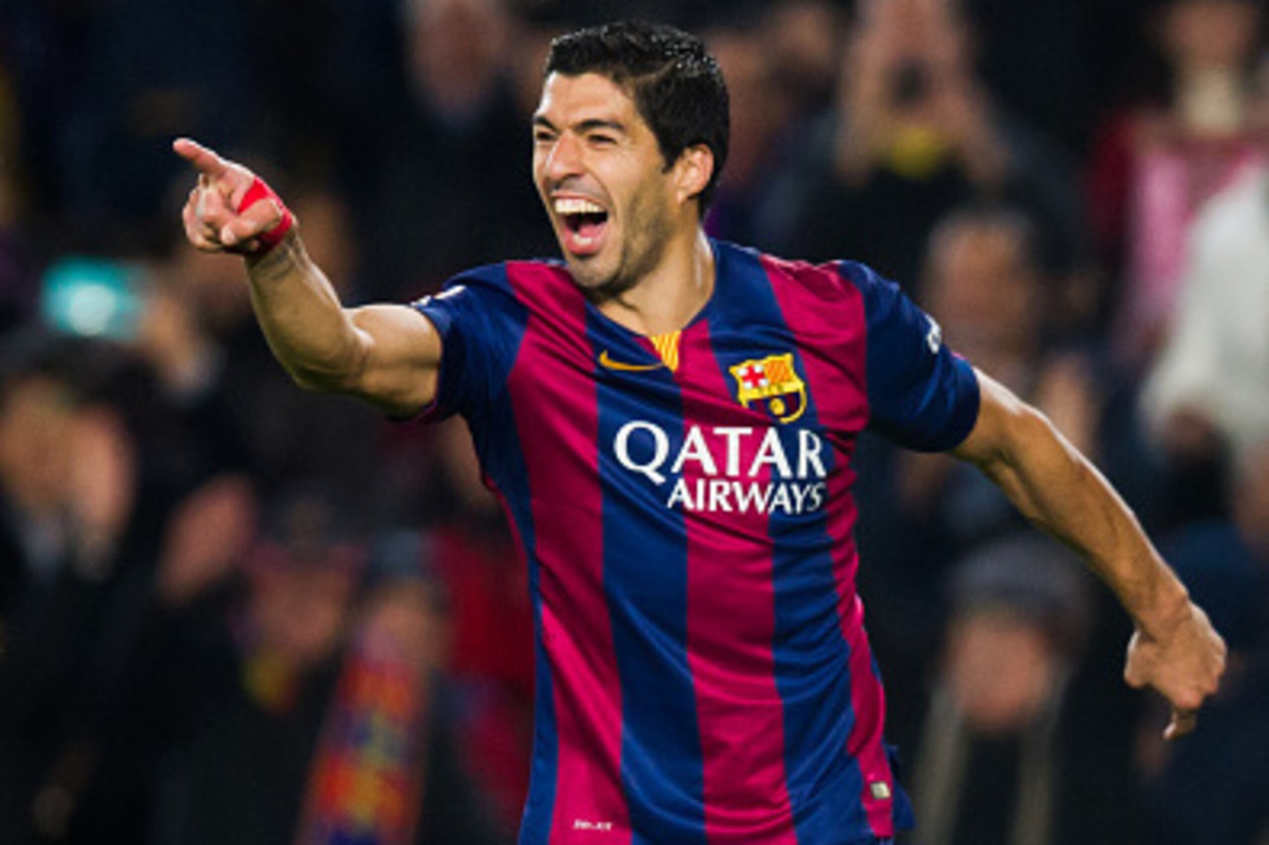 BARCELONA, SPAIN - JANUARY 11: Luis Suarez of FC Barcelona celebrates after scoring his team's second goal during the La Liga match between FC Barcelona and Club Atletico de Madrid at Camp Nou on January 11, 2015 in Barcelona, Spain. (Photo by Alex Caparr