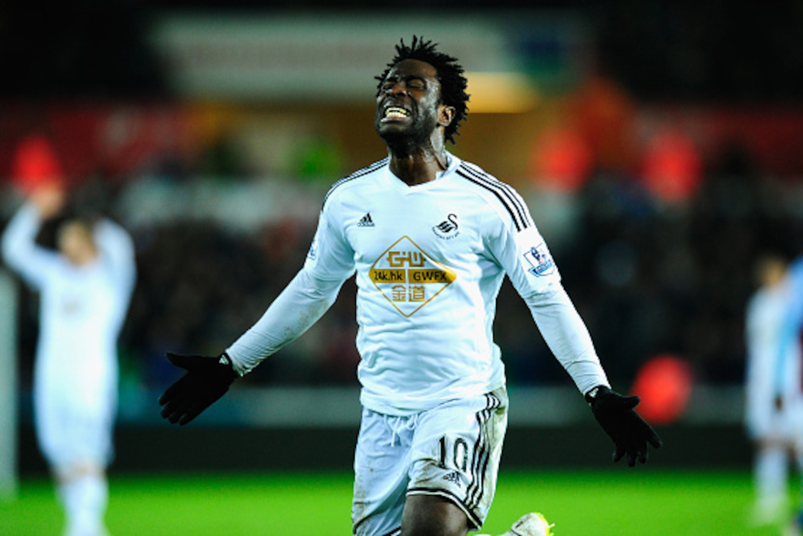SWANSEA, WALES - DECEMBER 26:  Wilfried Bony of Swansea reacts after having a goal dissalowed during the Barclays Premier League match between Swansea City and Aston Villa at Liberty Stadium on December 26, 2014 in Swansea, Wales.  (Photo by Stu Forster/G