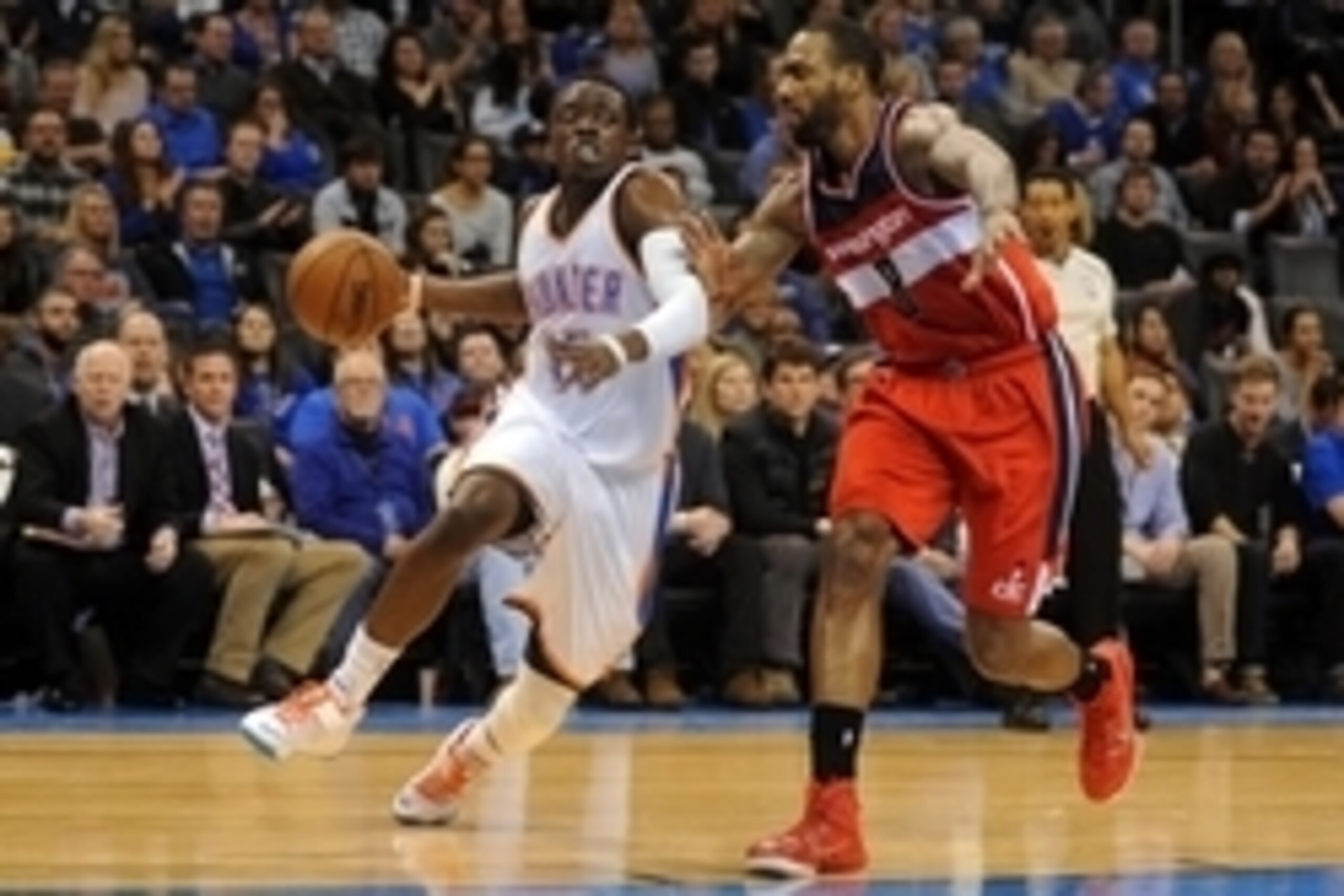 Jan 2, 2015; Oklahoma City, OK, USA; Oklahoma City Thunder guard Reggie Jackson (15) drives to the basket against Washington Wizards forward Rasual Butler (8) during the fourth quarter at Chesapeake Energy Arena. Mandatory Credit: Mark D. Smith-USA TODAY 
