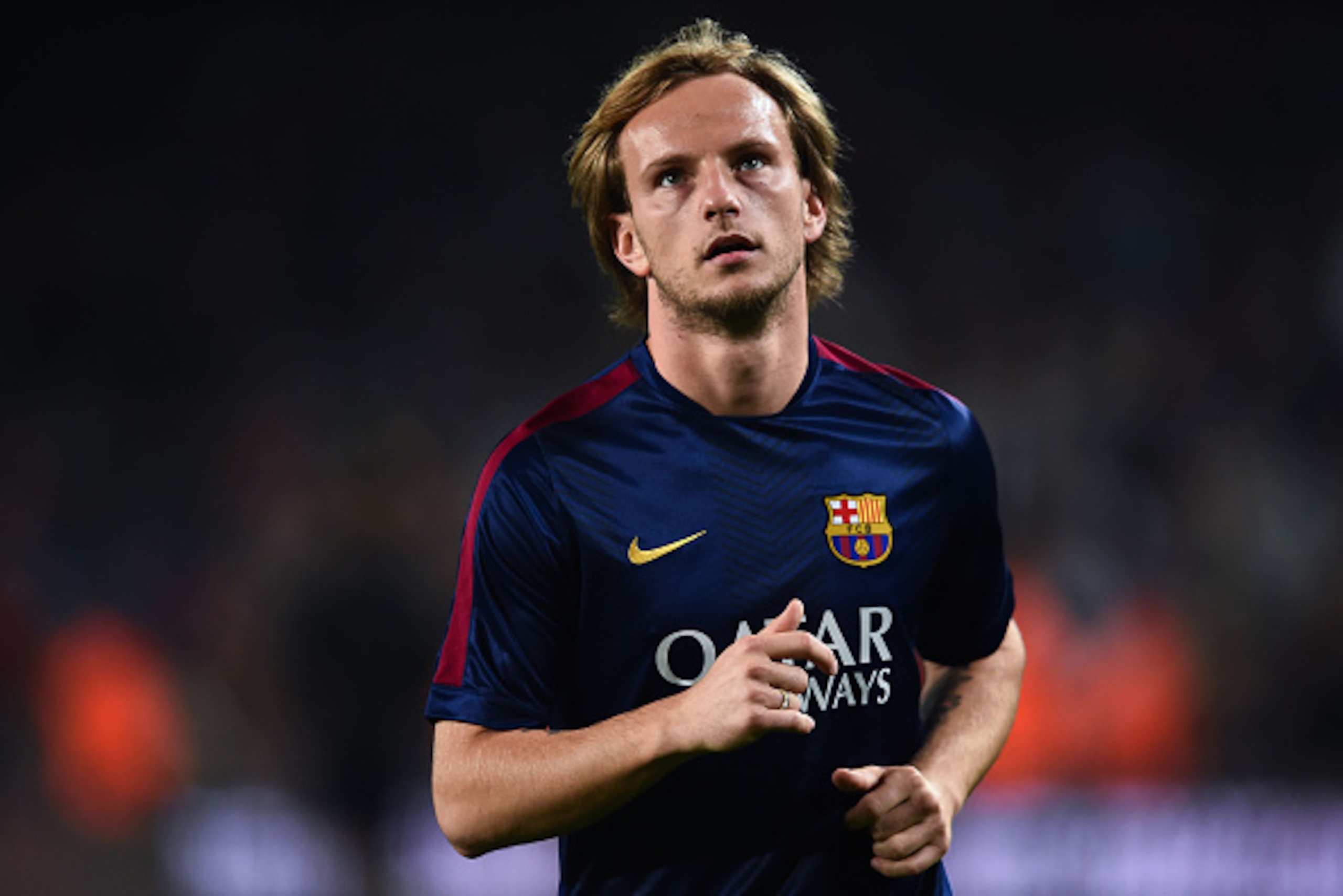BARCELONA, SPAIN - NOVEMBER 22:  Ivan Rakitic of FC Barcelona looks on  during the warm-up prior to the La Liga match between FC Barcelona and Sevilla FC at Camp Nou on November 22, 2014 in Barcelona, Spain. Lionel Messi beat the  number of goal in the Sp
