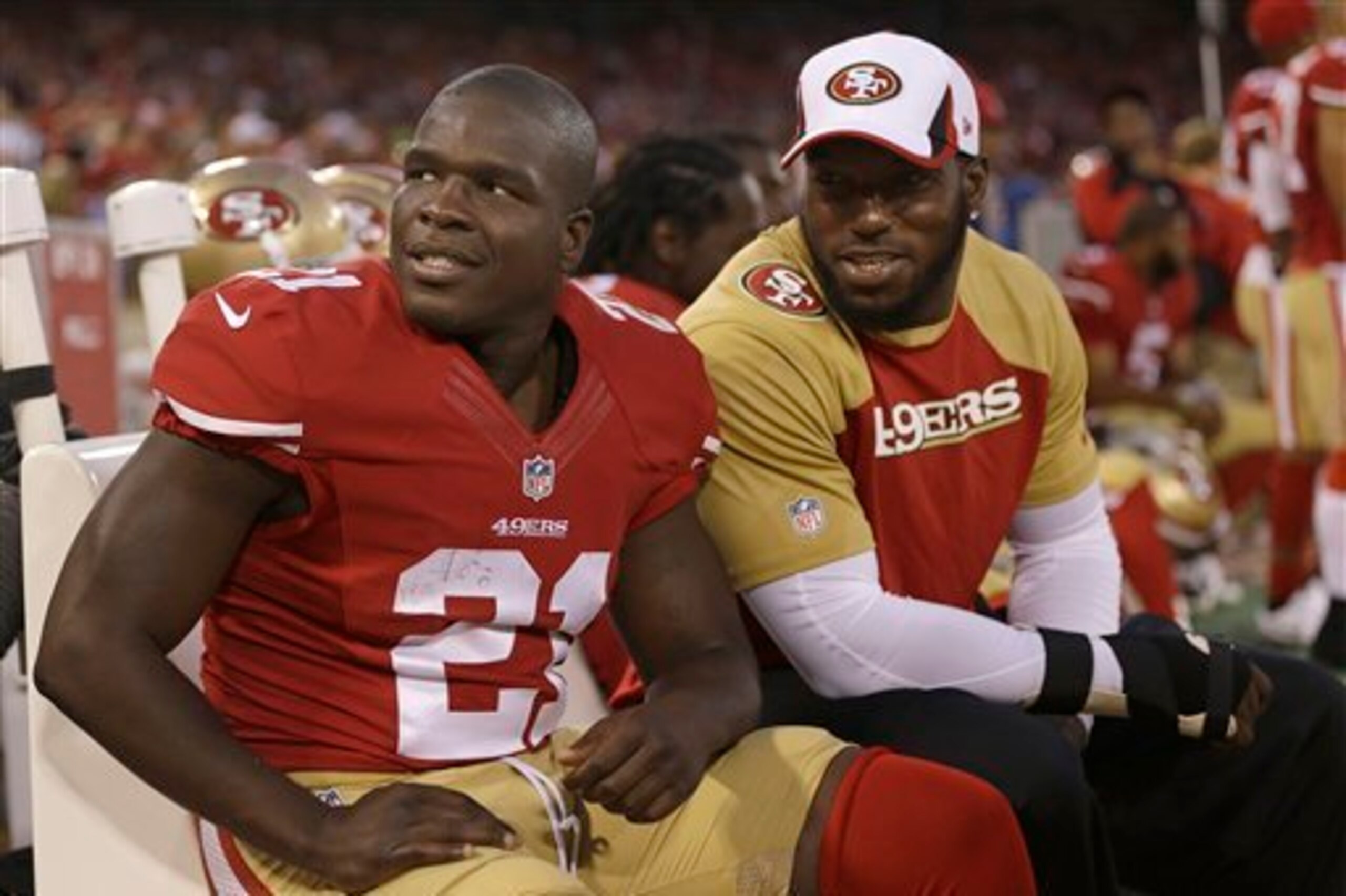 Homegrown draft picks like Frank Gore (left) and Patrick Willis have been rewarded by the 49ers with contract extensions.