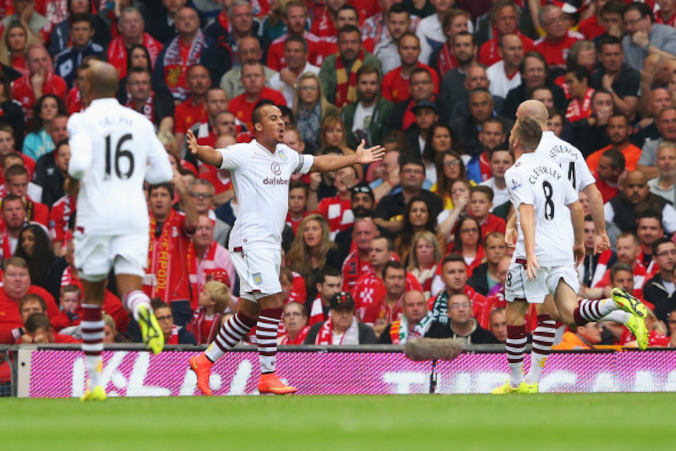 LIVERPOOL, ENGLAND - SEPTEMBER 13:  Gabriel Agbonlahor of Aston Villa celebrates scoring the opening goal during the Barclays Premier League match between Liverpool and Aston Villa at Anfield on September 13, 2014 in Liverpool, England.  (Photo by Alex Li