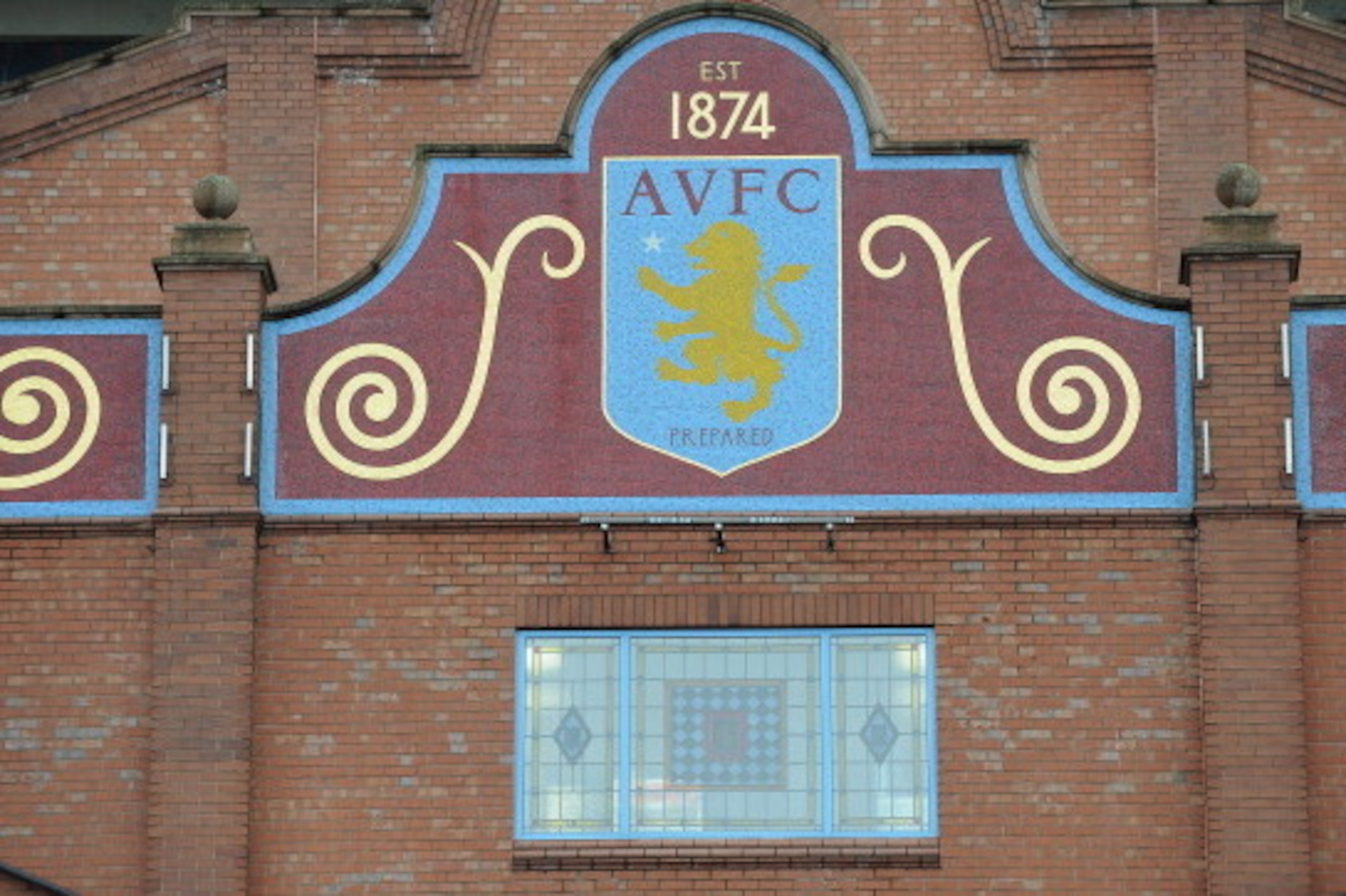 BIRMINGHAM, ENGLAND - MARCH 02: The Aston Villa club crest is displayed outside the Holte End at Villa Park before the Barclays Premier League match between Aston Villa and Norwich City at Villa Park on March 2, 2014 in Birmingham, England.  (Photo by Ton