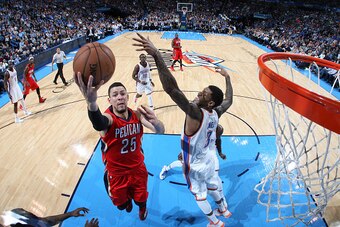OKLAHOMA CITY, OK- DECEMBER 21:  Austin Rivers #25 of the New Orleans Pelicans goes up for a shot against the Oklahoma City Thunder on December 21, 2014 at Chesapeake Energy Arena in Oklahoma City, OK. NOTE TO USER: User expressly acknowledges and agrees 