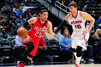 ATLANTA, GA - NOVEMBER 28: Austin Rivers #25 of the New Orleans Pelicans handles the ball against the Atlanta Hawks on November 28, 2014 at Philips Arena in Atlanta, Georgia.  NOTE TO USER: User expressly acknowledges and agrees that, by downloading and/o