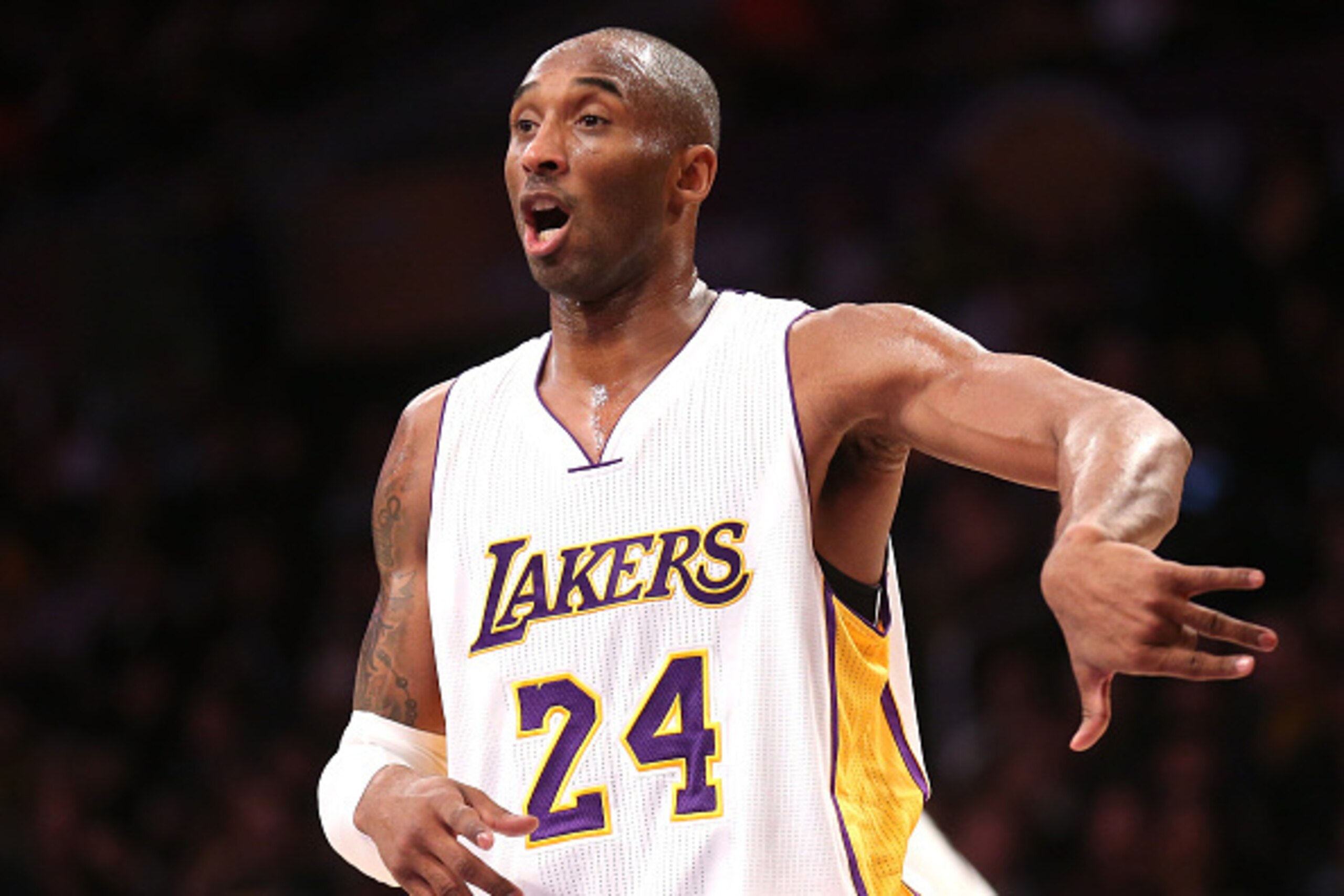 LOS ANGELES, CA - JANUARY 04:  Kobe Bryant #24 of the Los Angeles Lakers gives some on court coaching to a teammate during the game against the Indiana Pacers at Staples Center on January 4, 2015 in Los Angeles, California.The Lakers won 88-87.  NOTE TO U
