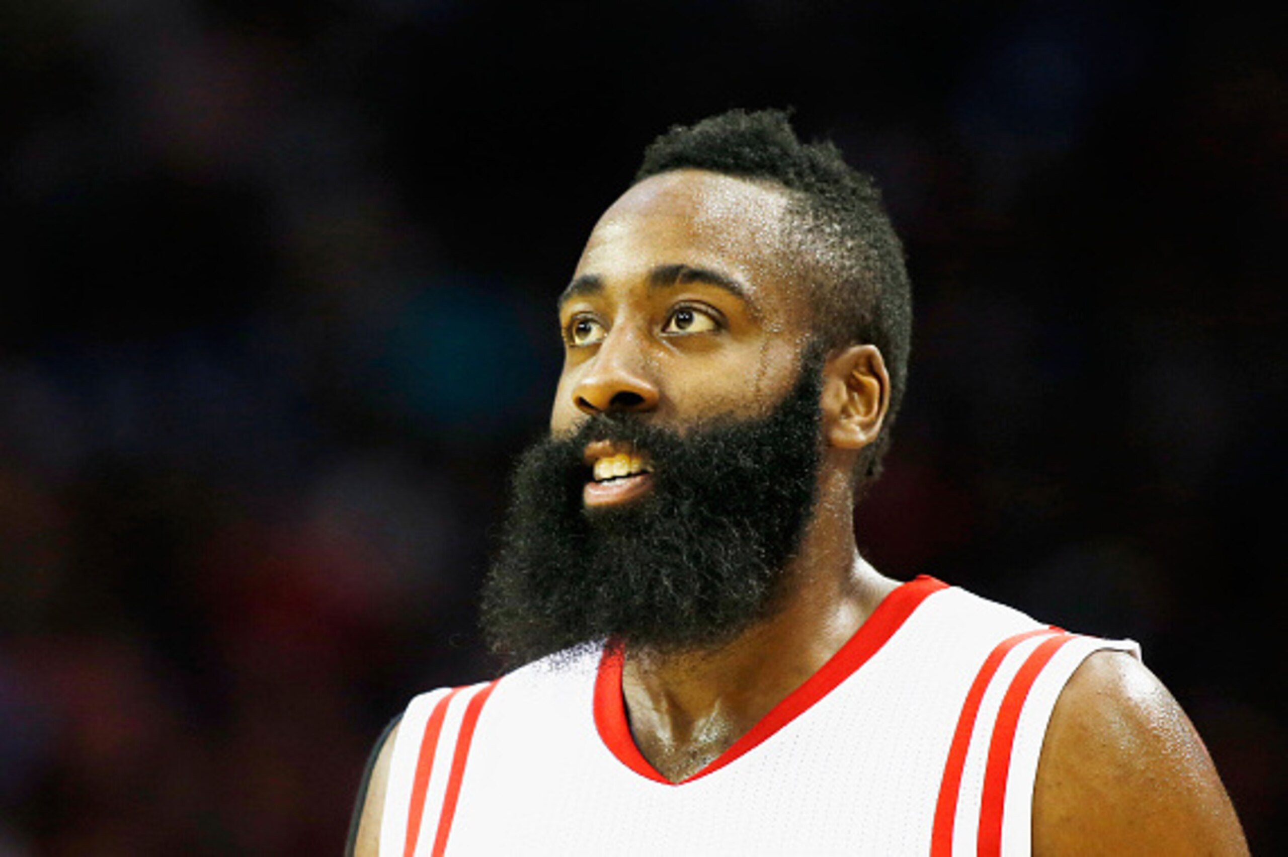 HOUSTON, TX - JANUARY 10:  James Harden #13 of the Houston Rockets walks across the court during their game against the Utah Jazz at the Toyota Center on January 10, 2015 in Houston, Texas.  NOTE TO USER: User expressly acknowledges and agrees that, by do