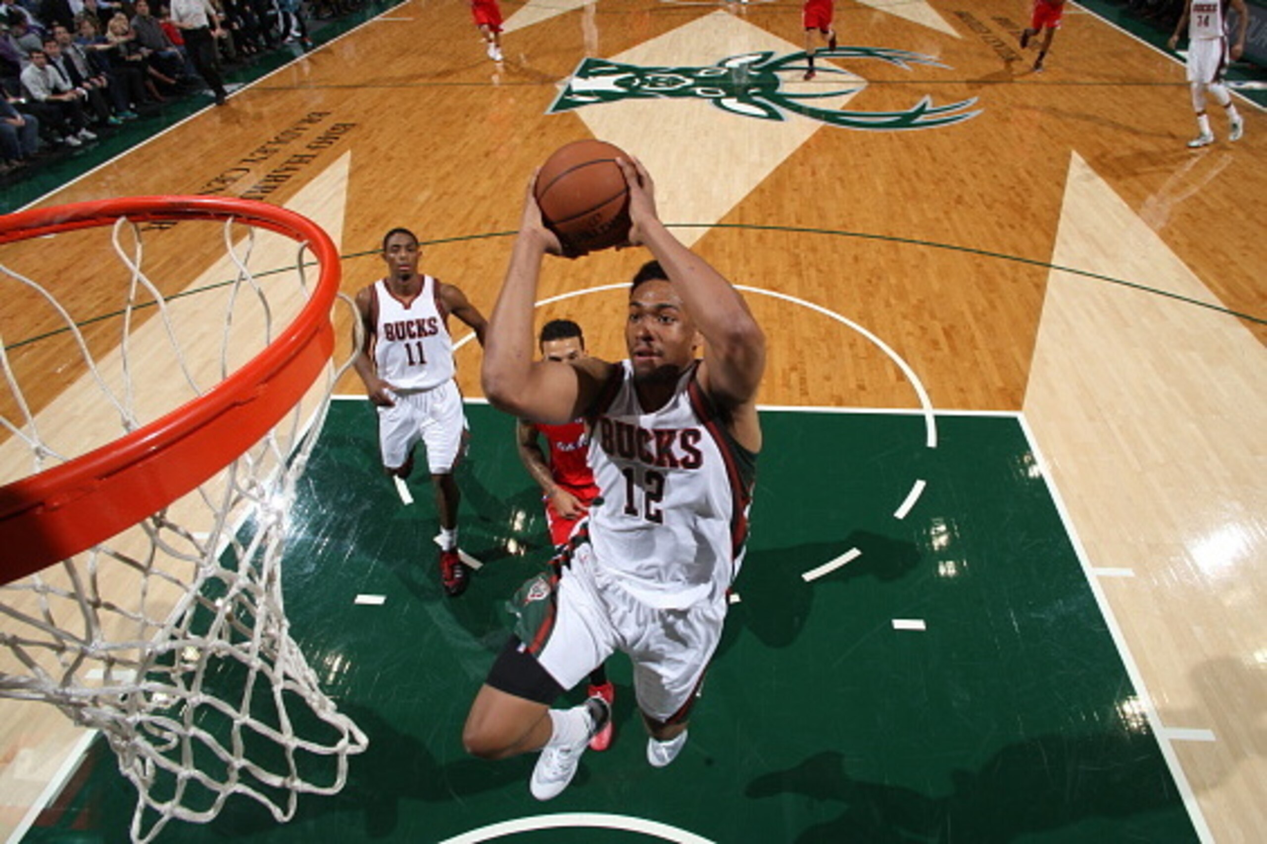 MILWAUKEE, WI - DECEMBER 13:  Jabari Parker #12 of the Milwaukee Bucks goes to the basket against the Los Angeles Clippers on December 13, 2014 at the BMO Harris Bradley Center in Milwaukee, Wisconsin. NOTE TO USER: User expressly acknowledges and agrees 