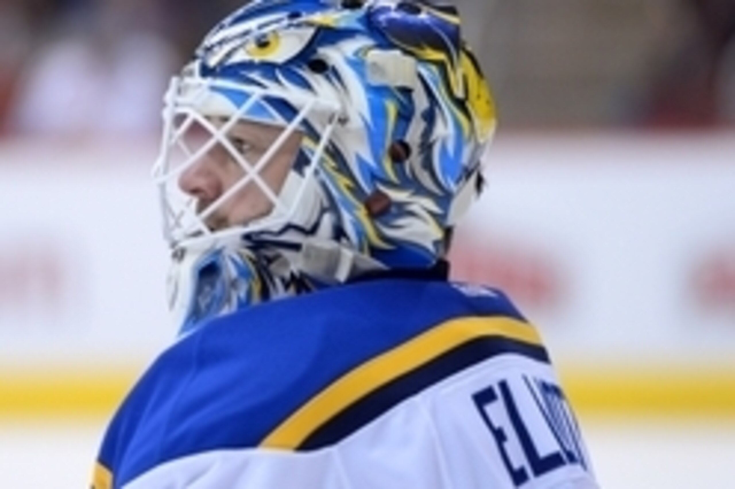 Jan 6, 2015; Glendale, AZ, USA; St. Louis Blues goalie Brian Elliott (1) looks on against the Arizona Coyotes at Gila River Arena. The Blues won 6-0. Mandatory Credit: Joe Camporeale-USA TODAY Sports