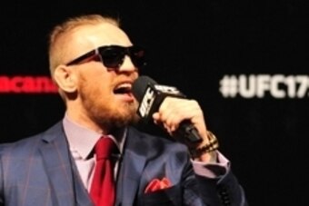 Oct 24, 2014; Rio de Janeiro, BRAZIL; Conor McGregor interacts with fans during a Q&A session before weigh-ins for UFC 179 at Ginasio do Maracanazinho. Mandatory Credit: Jason Silva-USA TODAY Sports