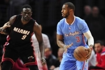 January 11, 2015; Los Angeles, CA, USA; Los Angeles Clippers guard Chris Paul (3) controls the ball against the Miami Heat during the first half at Staples Center. Mandatory Credit: Gary A. Vasquez-USA TODAY Sports