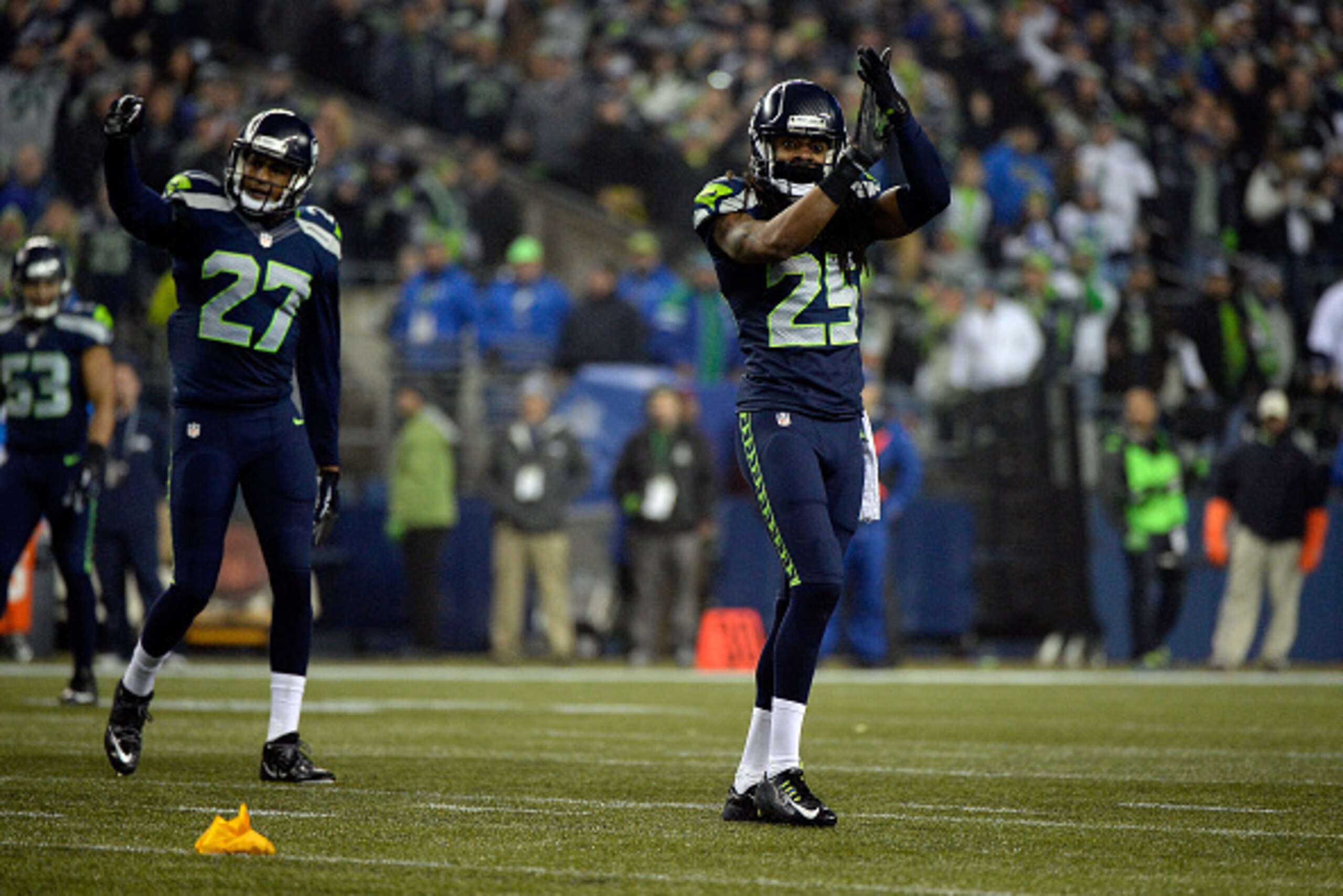 SEATTLE, WA - JANUARY 10:  Richard Sherman #25 of the Seattle Seahawks reacts against the Carolina Panthers during the 2015 NFC Divisional Playoff game at CenturyLink Field on January 10, 2015 in Seattle, Washington.  (Photo by Harry How/Getty Images)