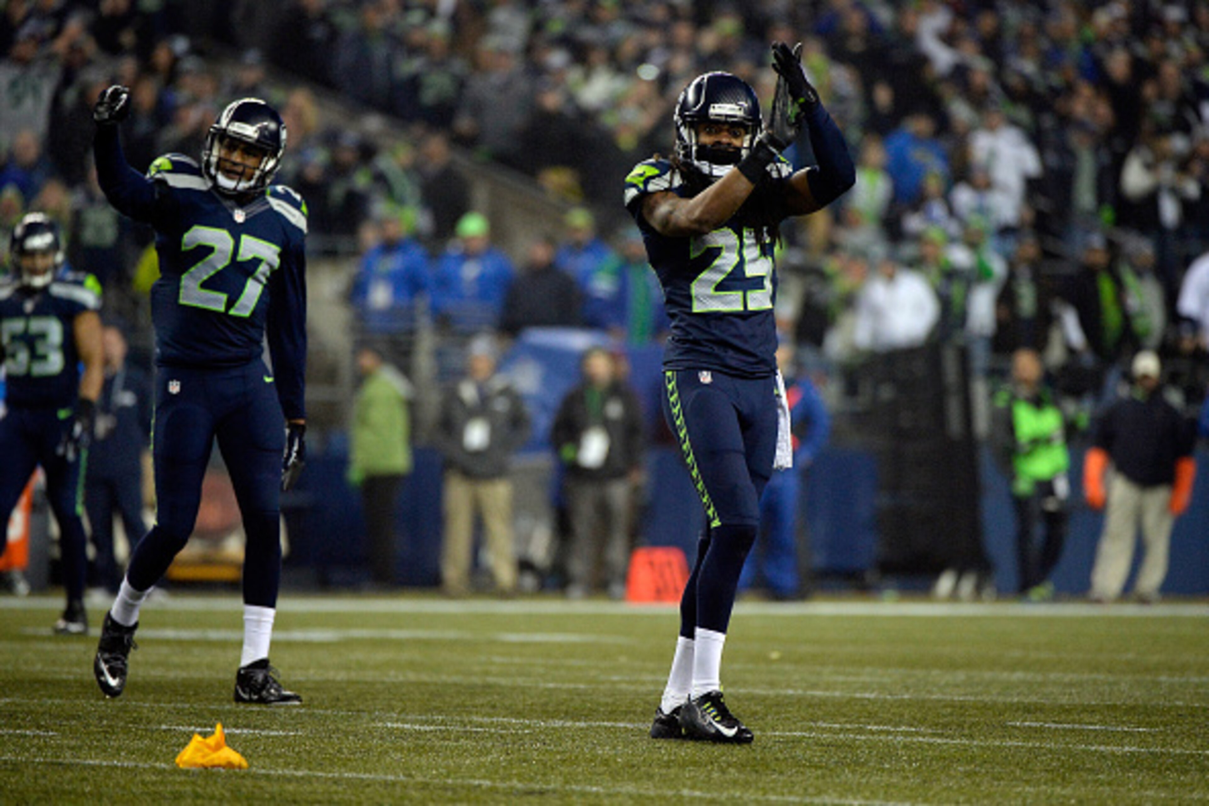 SEATTLE, WA - JANUARY 10:  Richard Sherman #25 of the Seattle Seahawks reacts against the Carolina Panthers during the 2015 NFC Divisional Playoff game at CenturyLink Field on January 10, 2015 in Seattle, Washington.  (Photo by Harry How/Getty Images)
