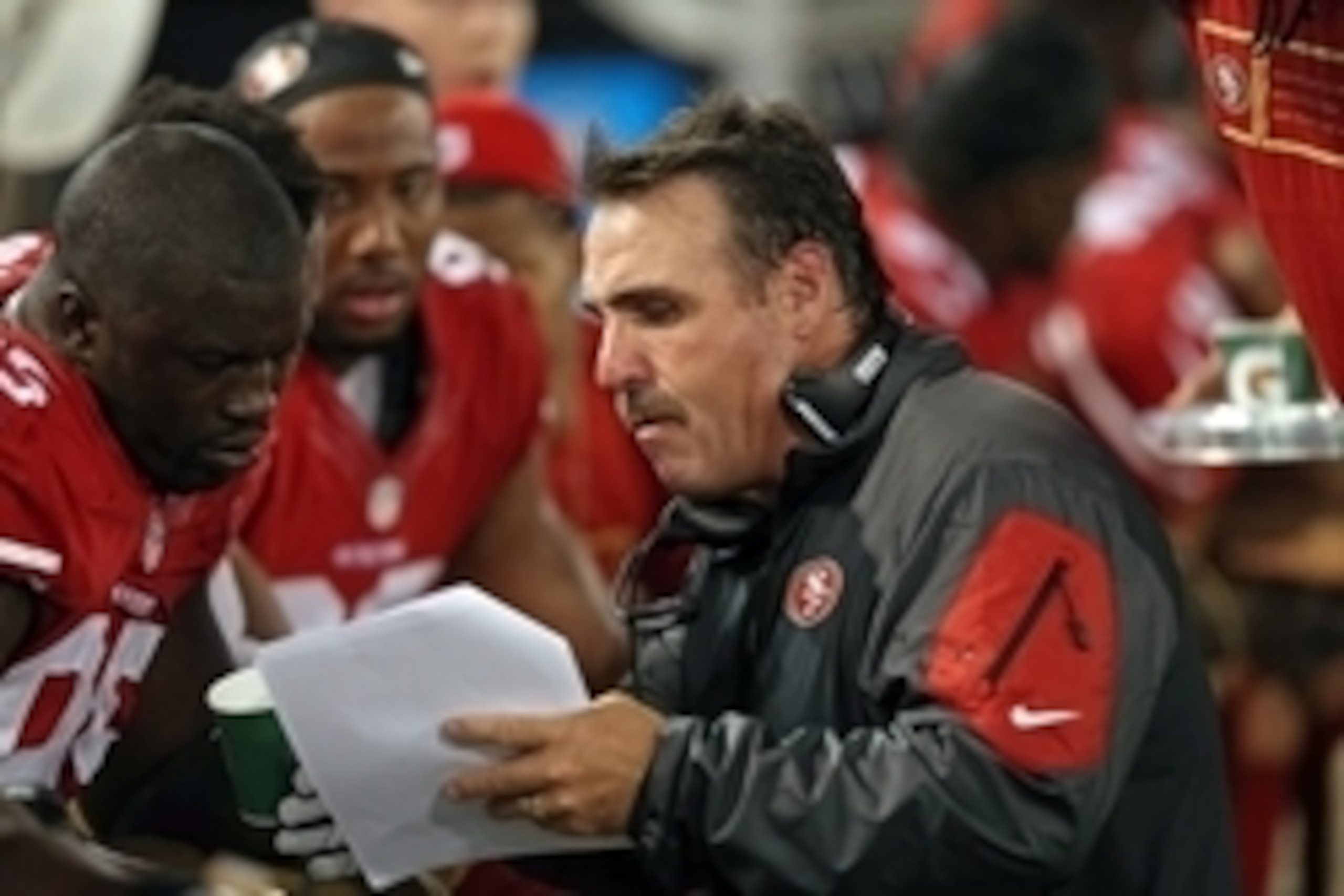Aug 7, 2014; Baltimore, MD, USA; San Francisco 49ers defensive line coach Jim Tomsula talks with players during the game against the Baltimore Ravens at M&T Bank Stadium. Mandatory Credit: Mitch Stringer-USA TODAY Sports Aug 7, 2014; Baltimore, MD, USA; San Francisco 49ers defensive line coach Jim Tomsula talks with players during the game against the Baltimore Ravens at M&T Bank Stadium. Mandatory Credit: Mitch Stringer-USA TODAY Sports