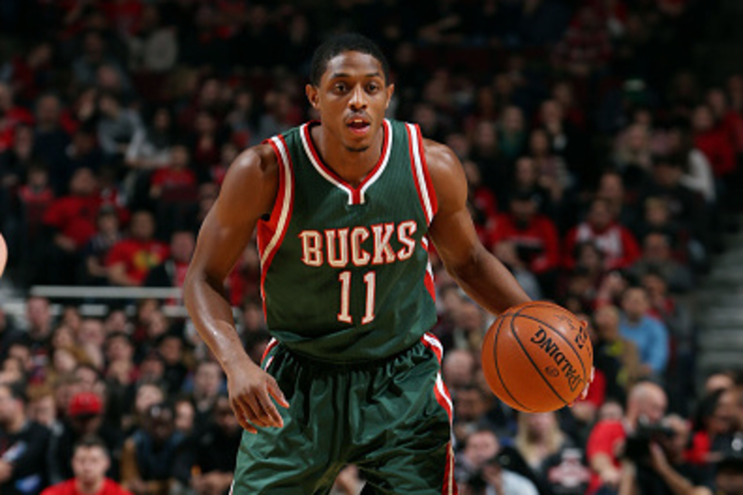 CHICAGO, IL - JANUARY 10: Brandon Knight #11 of the Milwaukee Bucks handles the ball against the Chicago Bulls on January 10, 2015 at the United Center in Chicago, Illinois. NOTE TO USER: User expressly acknowledges and agrees that, by downloading and or 