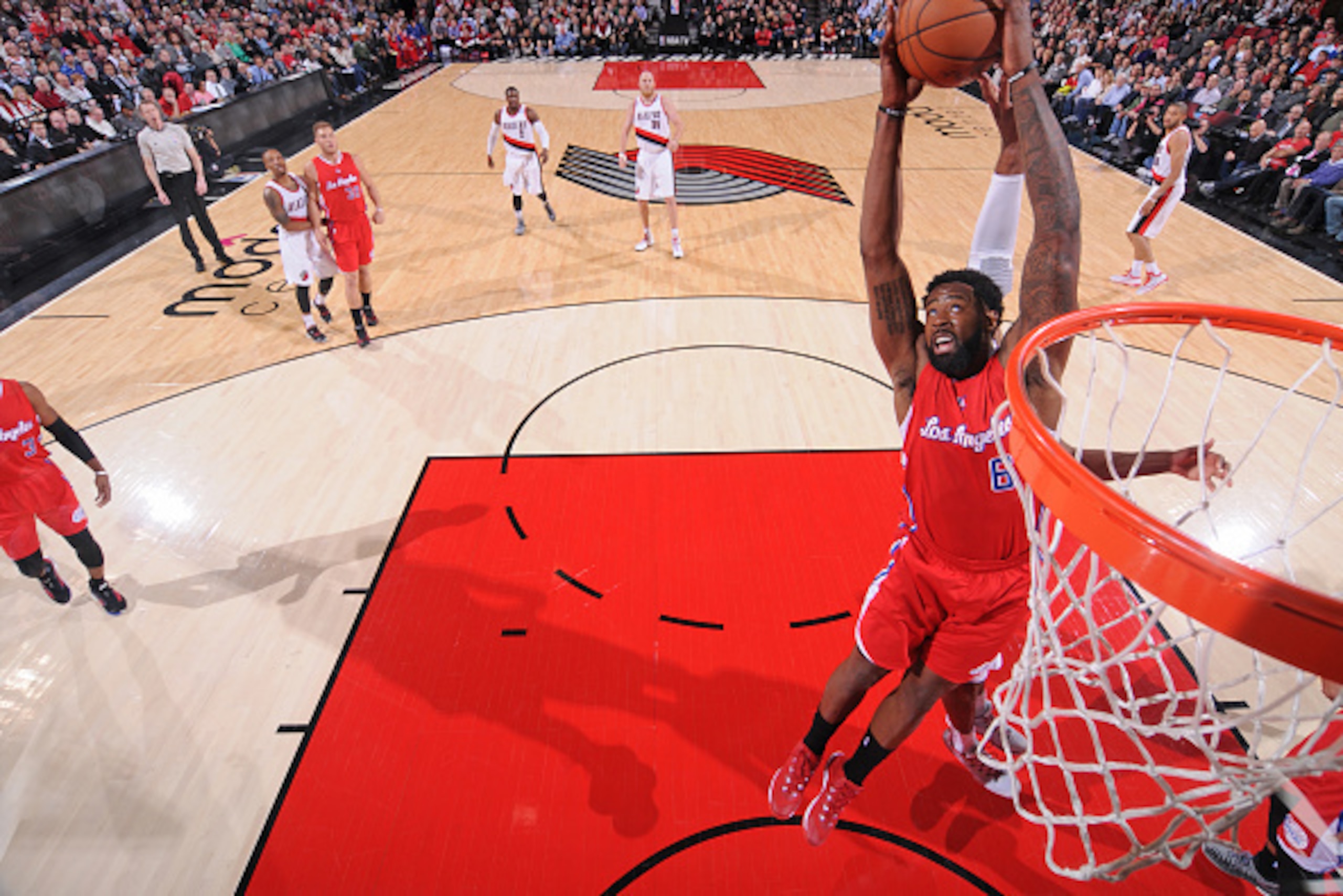 PORTLAND, OR - JANUARY 14:  DeAndre Jordan #6 of the Los Angeles Clippers grabs the rebound against the Portland Trail Blazers during the game on January 14, 2015 at the Moda Center in Portland, Oregon. NOTE TO USER: User expressly acknowledges and agrees