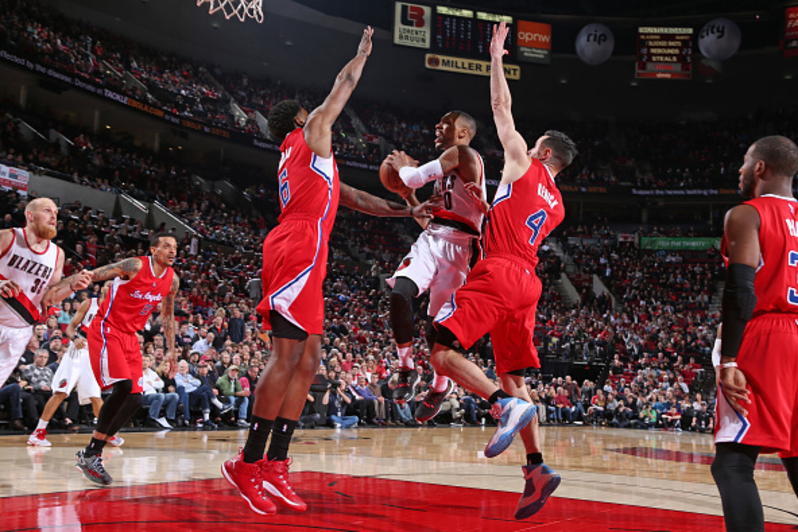 PORTLAND, OR - JANUARY 14:  Damian Lillard #0 of the Portland Trail Blazers shoots the ball against the Los Angeles Clippers during the game on January 14, 2015 at the Moda Center in Portland, Oregon. NOTE TO USER: User expressly acknowledges and agrees t