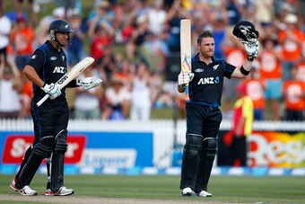 HAMILTON, NEW ZEALAND - JANUARY 15:  Brendon McCullum of New Zealand celebrates his century as Ross Taylor (L) watches on during the One Day International match between New Zealand and Sri Lanka at Seddon Park on January 15, 2015 in Hamilton, New Zealand.