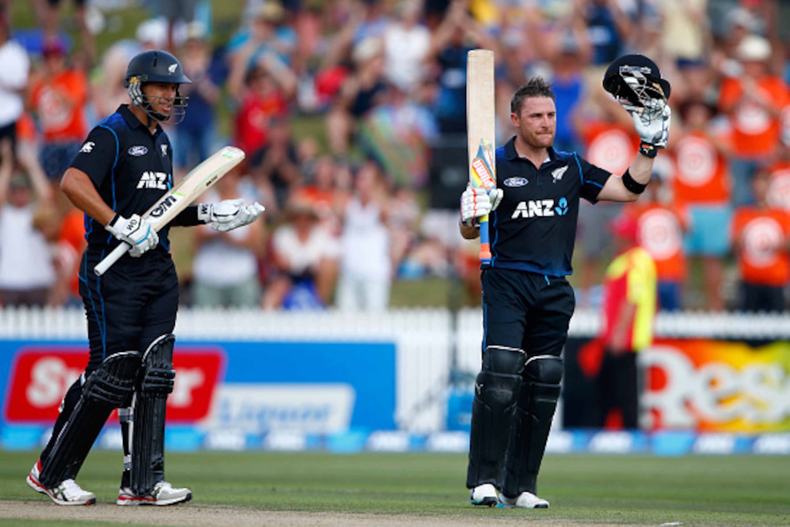 HAMILTON, NEW ZEALAND - JANUARY 15:  Brendon McCullum of New Zealand celebrates his century as Ross Taylor (L) watches on during the One Day International match between New Zealand and Sri Lanka at Seddon Park on January 15, 2015 in Hamilton, New Zealand.