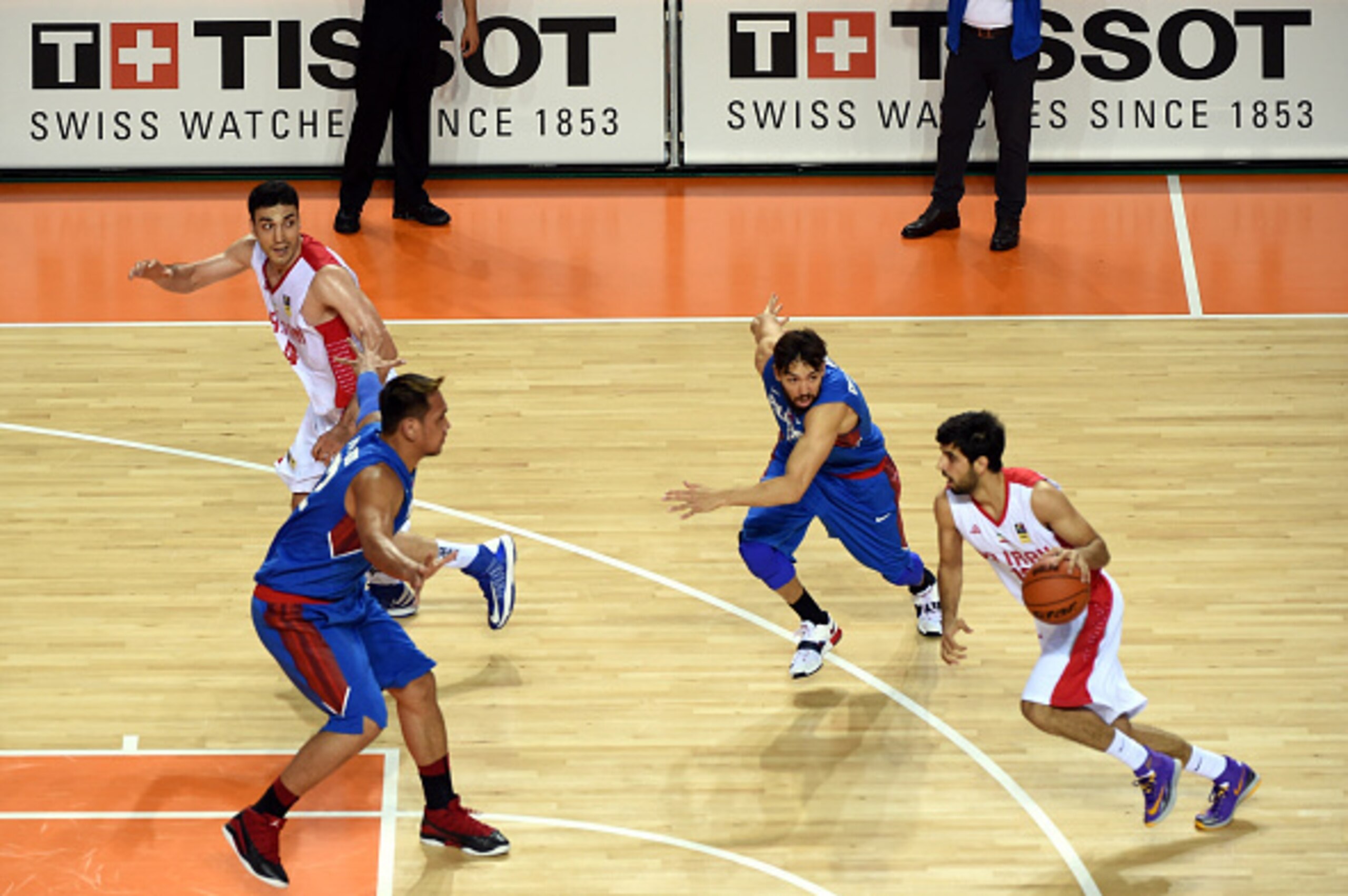 INCHEON, SOUTH KOREA - SEPTEMBER 25:  Iran and the Philipines in action during the Basketball Mens Pleliminary round match between Iran and the Philippines during day five of the 2014 Asian Games at Hwaseong Sports Complex Gymnasium on September 25, 2014 