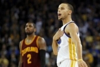 Jan 9, 2015; Oakland, CA, USA; Golden State Warriors guard Stephen Curry (30) hits his chest after attempting a shot against the Cleveland Cavaliers in the fourth quarter at Oracle Arena. The Warriors defeated the Cavaliers 112-94. Mandatory Credit: Cary 