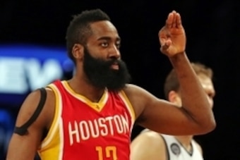 Jan 12, 2015; Brooklyn, NY, USA; Houston Rockets guard James Harden (13) reacts after making a three-point shot against the Brooklyn Nets during the third quarter at the Barclays Center. The Rockets defeated the Nets 113-99. Mandatory Credit: Adam Hunger-