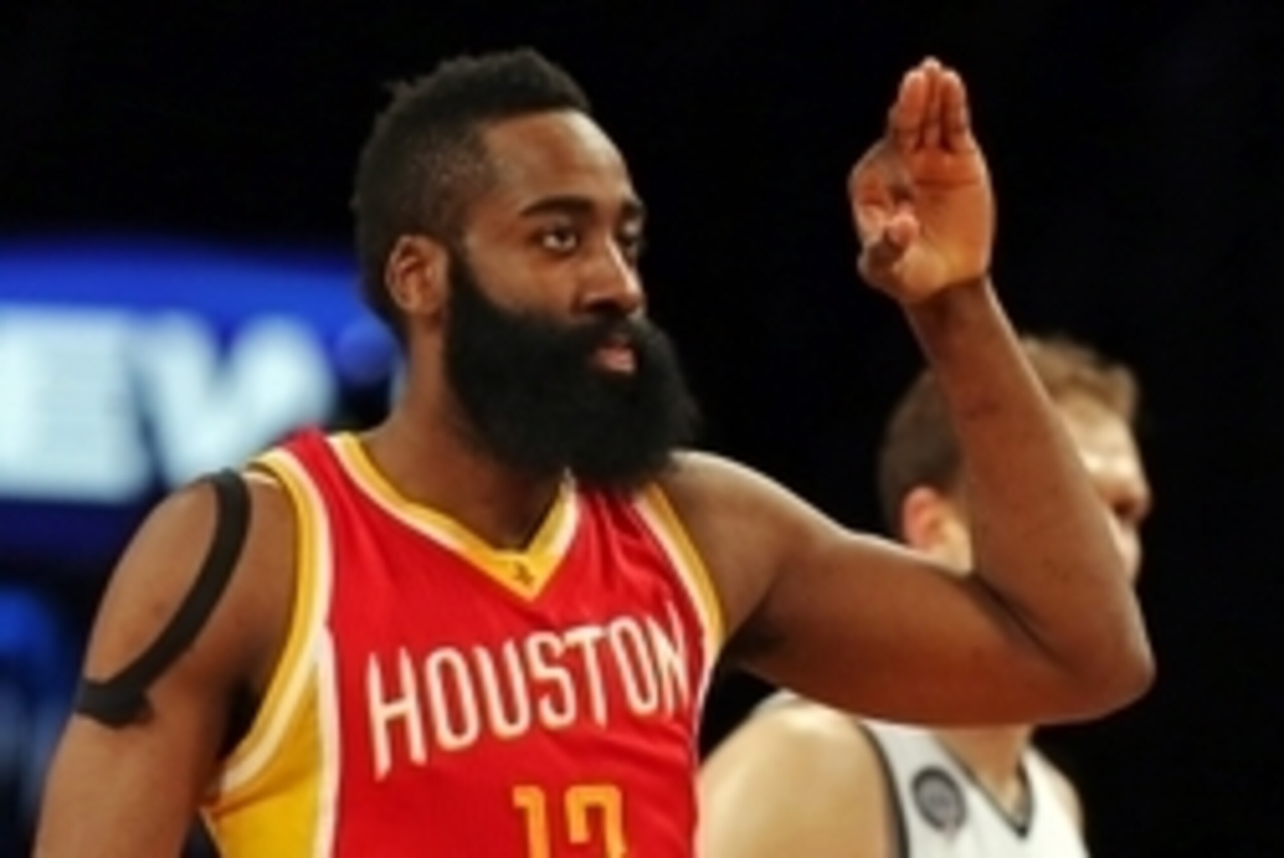Jan 12, 2015; Brooklyn, NY, USA; Houston Rockets guard James Harden (13) reacts after making a three-point shot against the Brooklyn Nets during the third quarter at the Barclays Center. The Rockets defeated the Nets 113-99. Mandatory Credit: Adam Hunger-