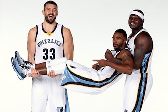MEMPHIS, TN - SEPTEMBER 29: Marc Gasol #33, Mike Conley #11 and Zach Randolph #50 of the Memphis Grizzlies poses for a portrait during Memphis Grizzlies Media Day on September 29, 2014 at FedExForum in Memphis, Tennessee.  NOTE TO USER: User expressly ack