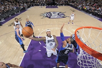 SACRAMENTO, CA -  JANUARY 13: DeMarcus Cousins #15 of the Sacramento Kings goes for the dunk against Tyson Chandler #6 of the Dallas Mavericks during the game on January 13, 2015 at Sleep Train Arena in Sacramento, California . NOTE TO USER: User expressl