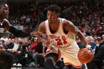 CHICAGO, IL - JANUARY 12:  Jimmy Butler #21 of the Chicago Bulls drives to the basket against the Orlando Magic on January 12, 2015 at the United Center in Chicago, Illinois. NOTE TO USER: User expressly acknowledges and agrees that, by downloading and or