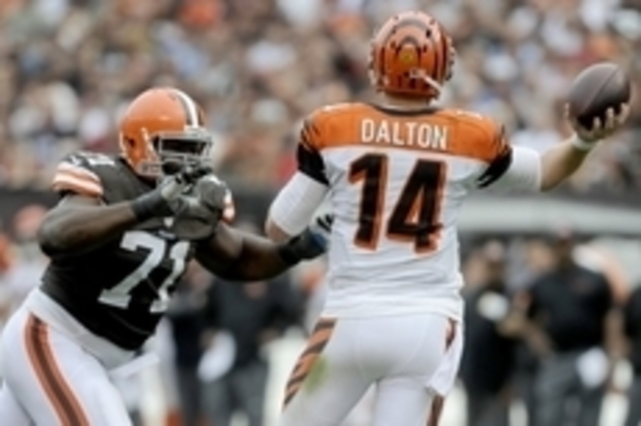 Sep 29, 2013; Cleveland, OH, USA; Cleveland Browns defensive end Ahtyba Rubin (71) pressures Cincinnati Bengals quarterback Andy Dalton (14) during the fourth quarter at FirstEnergy Stadium. The Browns beat the Bengals 17-6. Mandatory Credit: Ken Blaze-U Sep 29, 2013; Cleveland, OH, USA; Cleveland Browns defensive end Ahtyba Rubin (71) pressures Cincinnati Bengals quarterback Andy Dalton (14) during the fourth quarter at FirstEnergy Stadium. The Browns beat the Bengals 17-6. Mandatory Credit: Ken Blaze-U