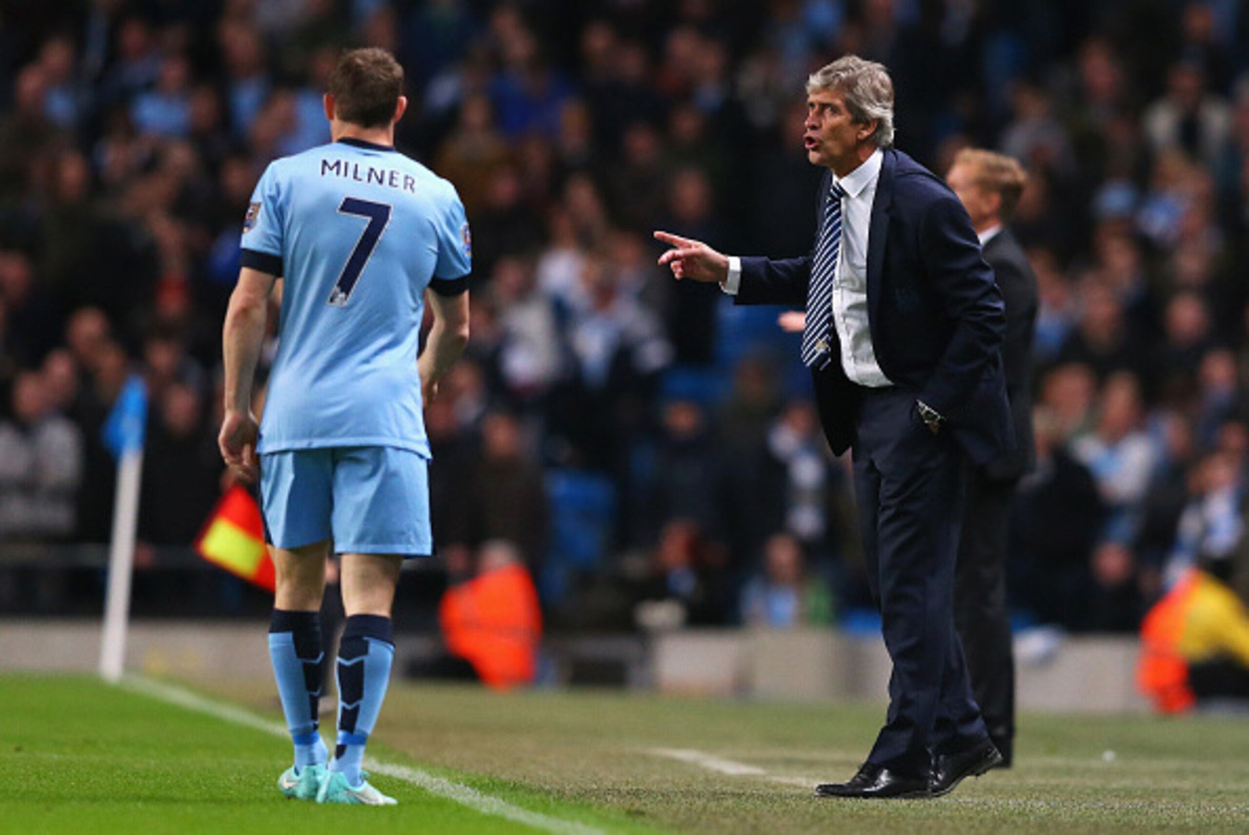 MANCHESTER, ENGLAND - NOVEMBER 22: Manuel Pellegrini, manager of Manchester City talks to James Milner of Manchester City during the Barclays Premier League match between Manchester City and Swansea City at Etihad Stadium on November 22, 2014 in Mancheste MANCHESTER, ENGLAND - NOVEMBER 22: Manuel Pellegrini, manager of Manchester City talks to James Milner of Manchester City during the Barclays Premier League match between Manchester City and Swansea City at Etihad Stadium on November 22, 2014 in Mancheste