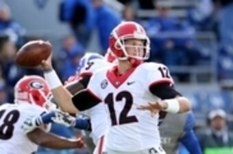 Nov 8, 2014; Lexington, KY, USA; Georgia Bulldogs quarterback Brice Ramsey (12) throws a pass against the Kentucky Wildcats in the second half at Commonwealth Stadium. Georgia defeated Kentucky 63-31. Mandatory Credit: Mark Zerof-USA TODAY Sports