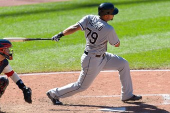 CLEVELAND, OH - SEPTEMBER 7: Jose Abreu #79 of the Chicago White Sox hits a single during the ninth inning against the Cleveland Indians at Progressive Field on September 7, 2014 in Cleveland, Ohio. The Indians defeated the White Sox 2-0. (Photo by Jason 