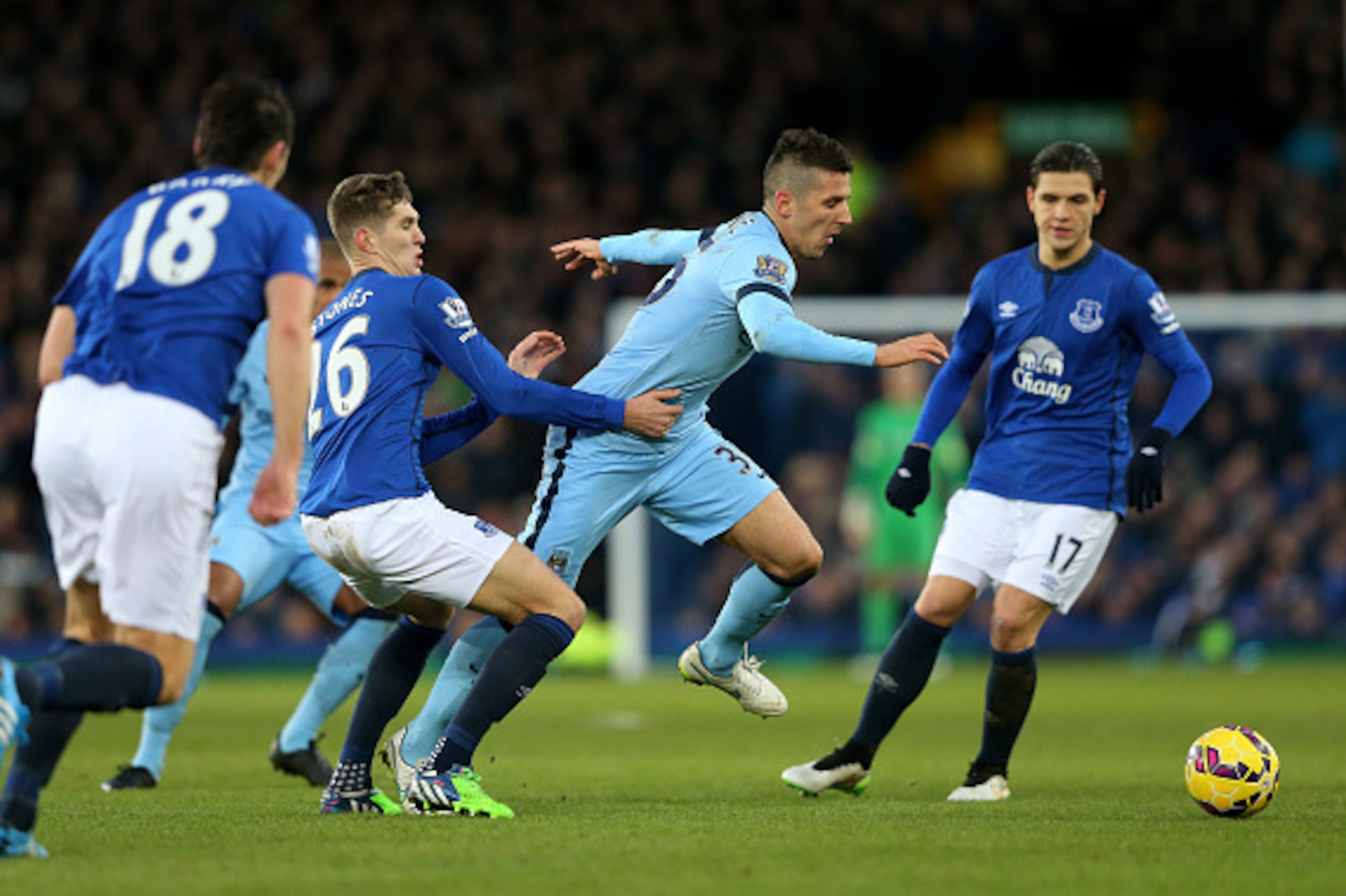 LIVERPOOL, ENGLAND - JANUARY 10:  Stevan Jovetic of Manchester City goes past John Stones of Everton during the Barclays Premier League match between Everton and Manchester City at Goodison Park on January 10, 2015 in Liverpool, England.  (Photo by Alex L