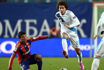 KHIMKI, RUSSIA - NOVEMBER 01: Roman Eremenko (L) of PFC CSKA Moscow challenged by Axel Witsel of FC Zenit St. Petersburg during the Russian Premier League match between PFC CSKA Moscow and FC Zenit St. Petersburg at the Arena Khimki Stadium on November 01